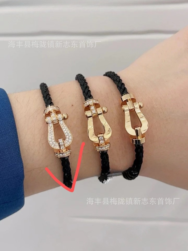 Diamond-encrusted braided leather cord bracelet