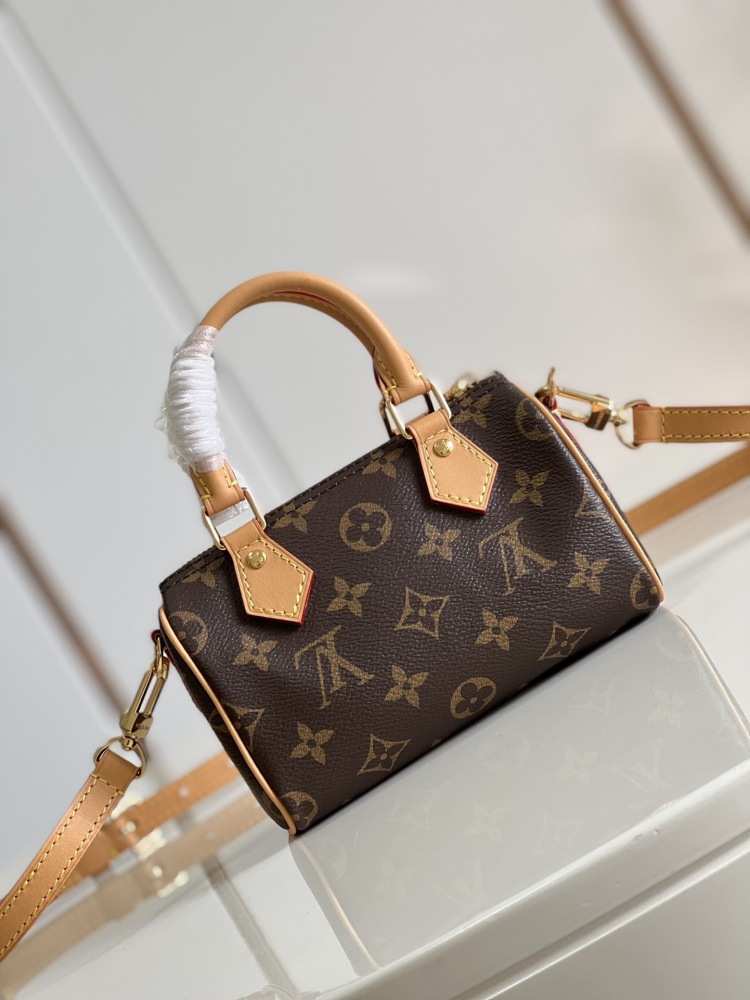 LV M81085 Nano Speedy handbag, made of classic Monogram canvas, exudes an ultimate feminine charm with exquisite and lightweight stitching