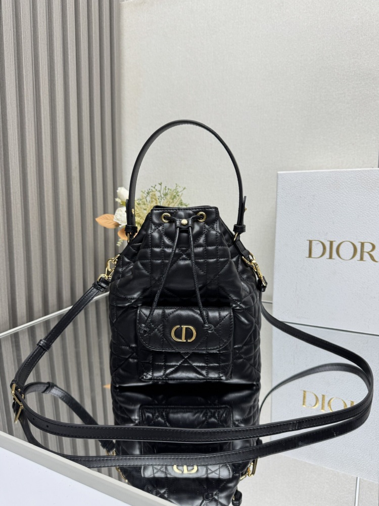 Dior M3372 is a Dior Caro bucket bag made of carefully crafted materials such as black sheepskin leather, adorned with oversized wicker patterned stitching and spacious drawstring compartments