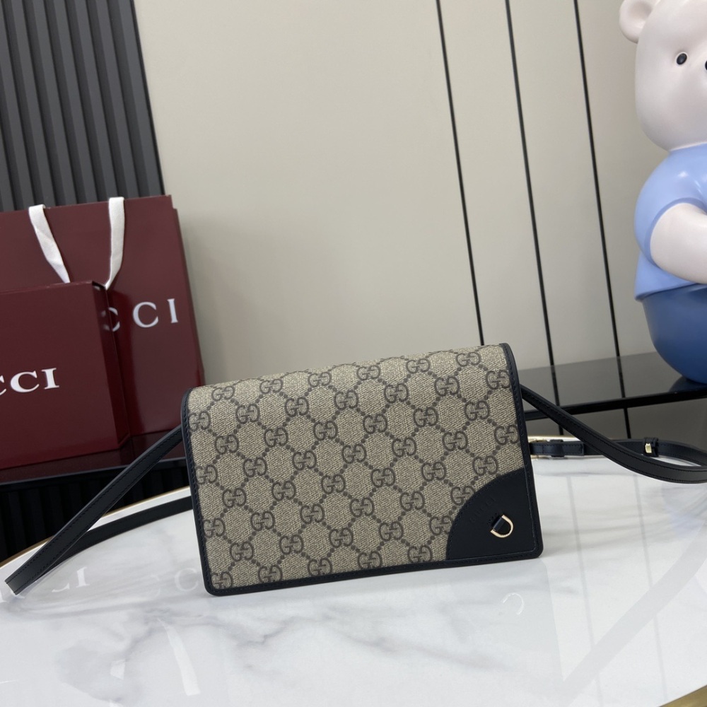 Gucci's Emblem Series Ultra Mini Shoulder Backpack: This beige and dark brown ultra mini shoulder backpack is a new interpretation of the brand's new small accessory series