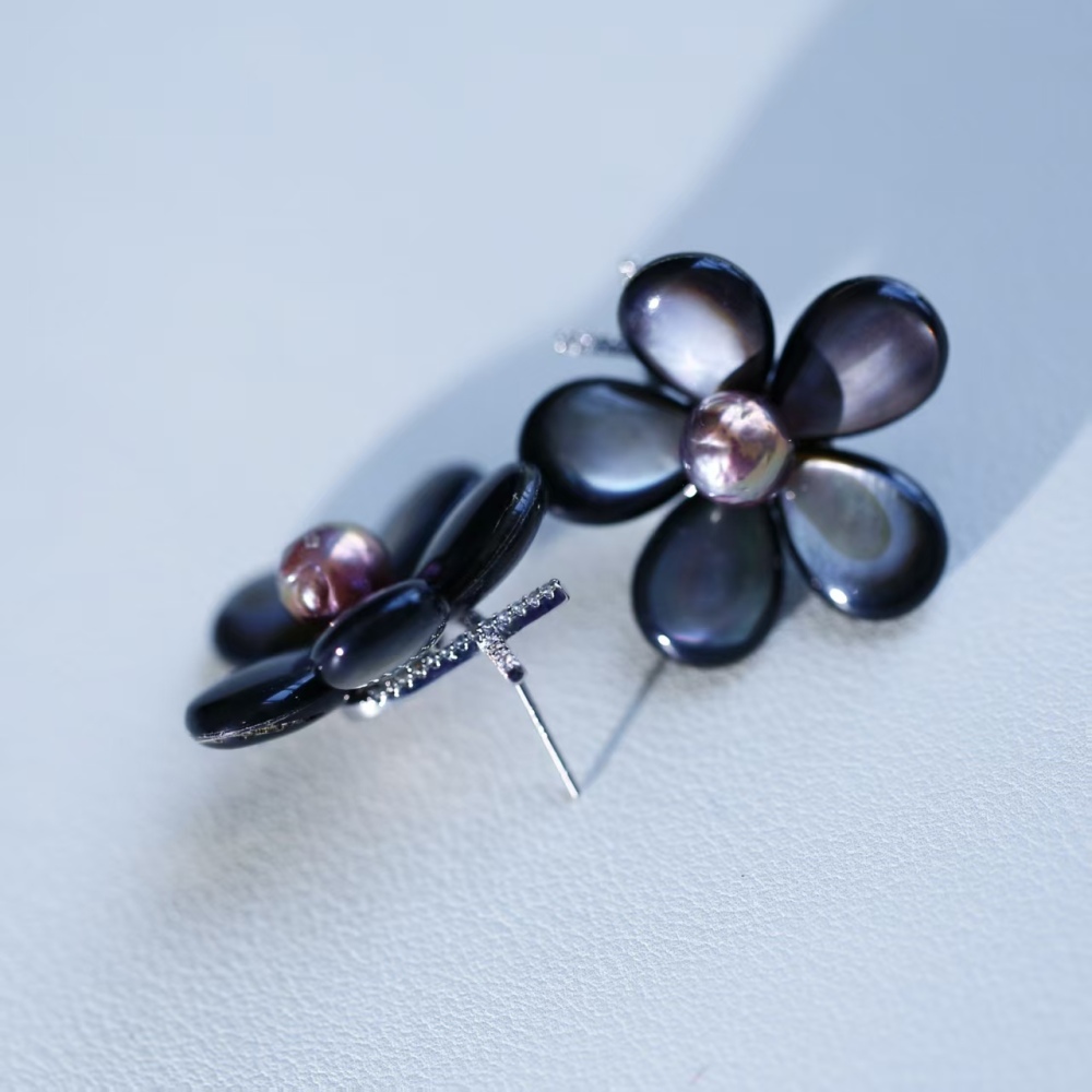 Elegant hand-woven black butterfly shell paired with freshwater metal shiny round pearl stud earrings, fashionable female ear accessory