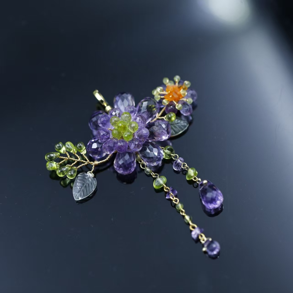 Hand-woven amethyst paired with peridot fire opal flower pendant