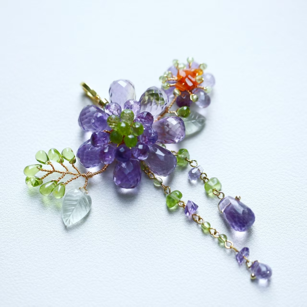 Hand-woven amethyst paired with peridot fire opal flower pendant