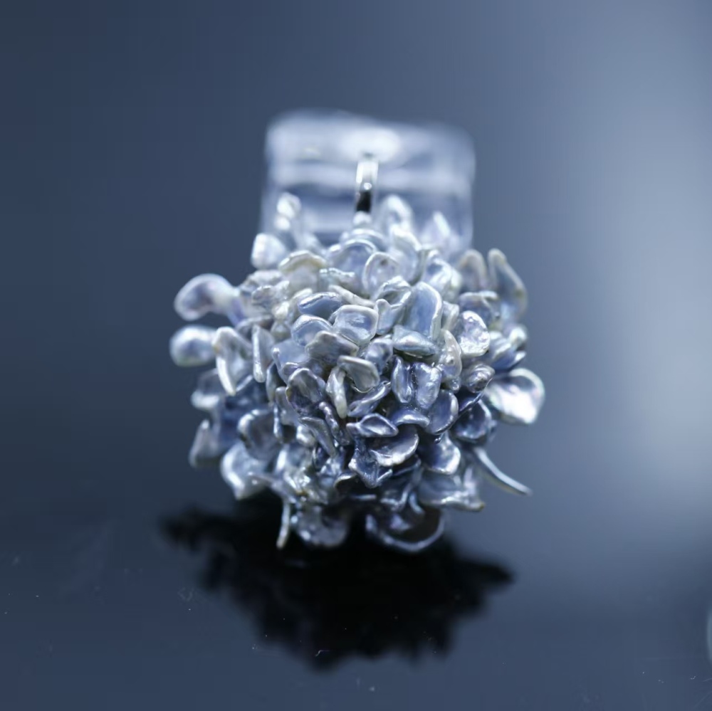 Hand-woven Flower-shaped South Sea Blue Keshi Pearl Pendant