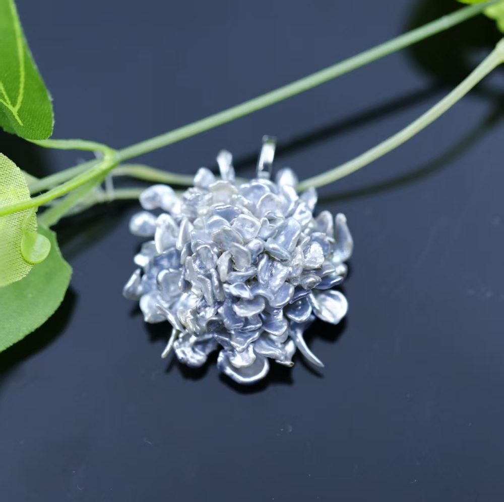 Hand-woven Flower-shaped South Sea Blue Keshi Pearl Pendant
