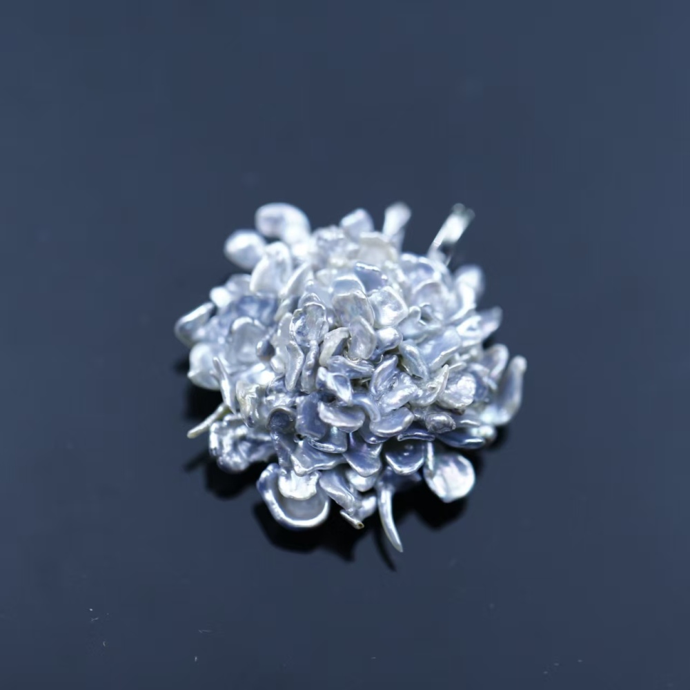 Hand-woven Flower-shaped South Sea Blue Keshi Pearl Pendant