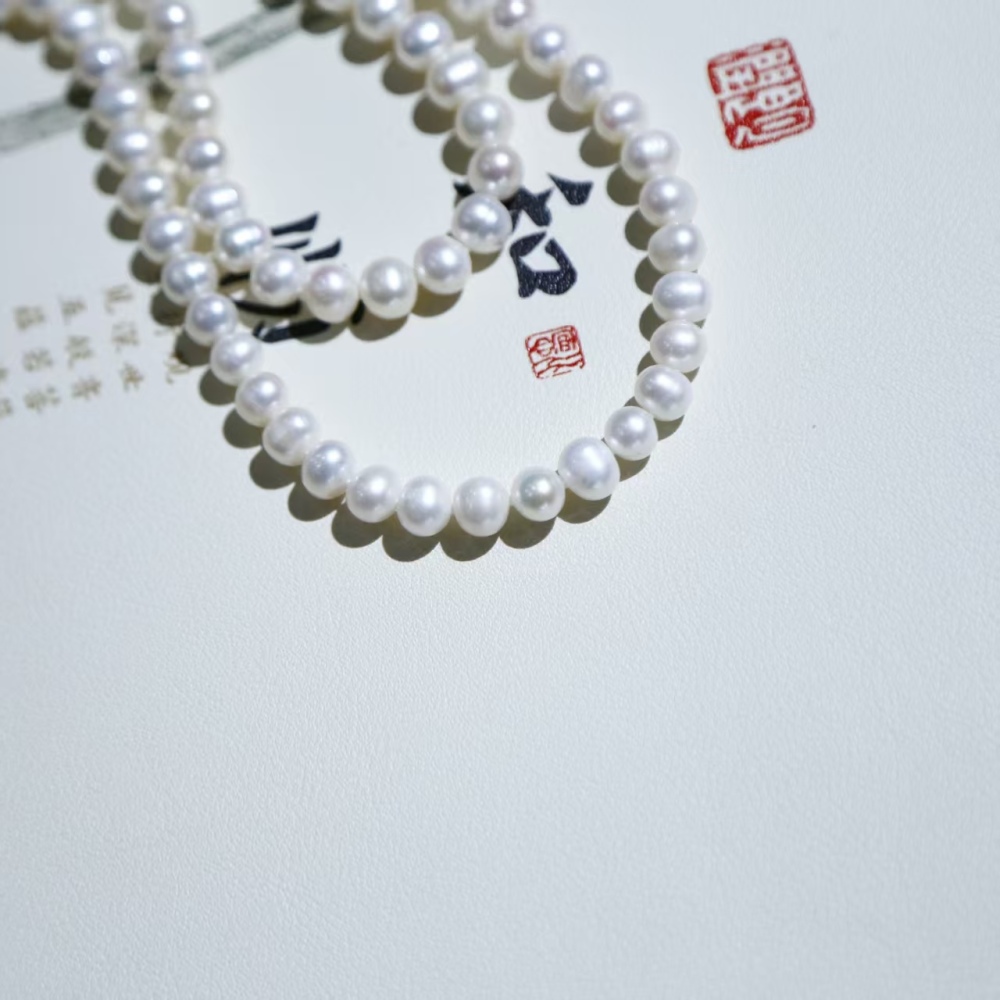 Freshwater white cuclear-free luxury double-loop pearl sweater chain necklace paired with 925 silver accessories