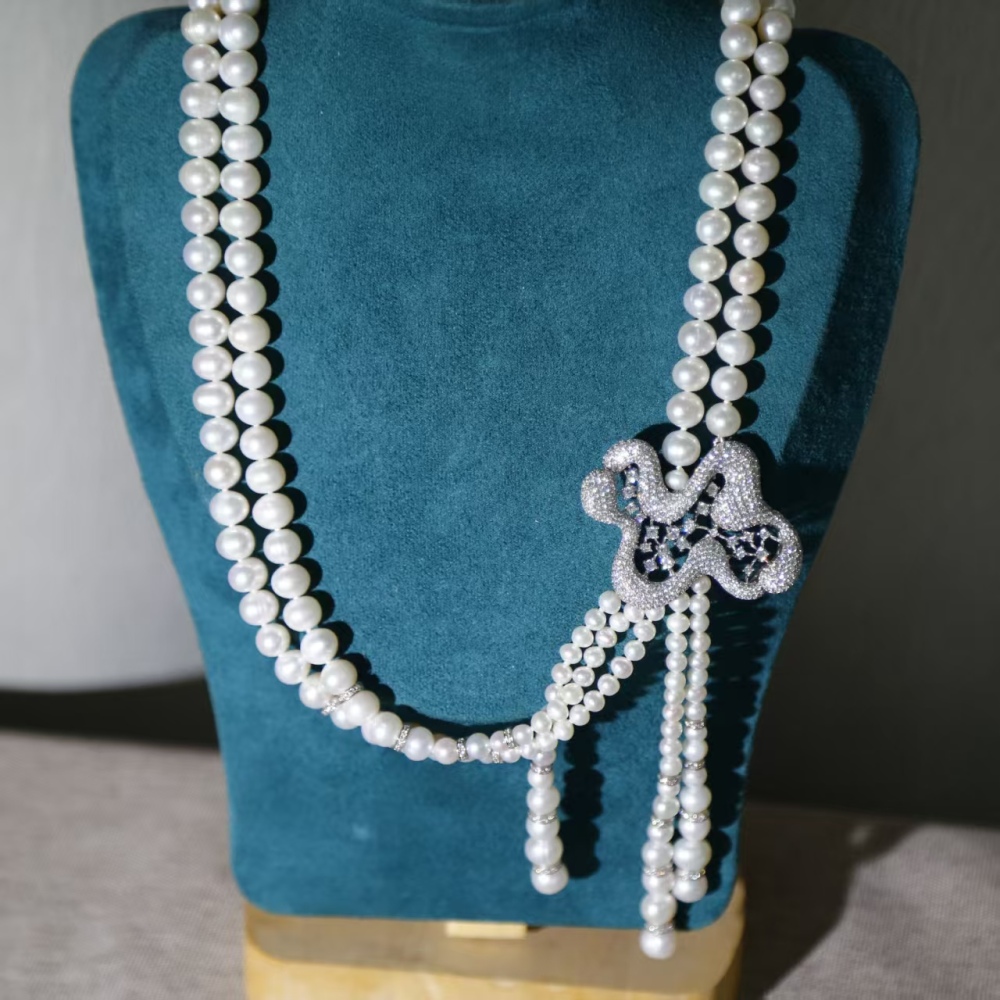 Freshwater white cuclear-free luxury double-loop pearl sweater chain necklace paired with 925 silver accessories