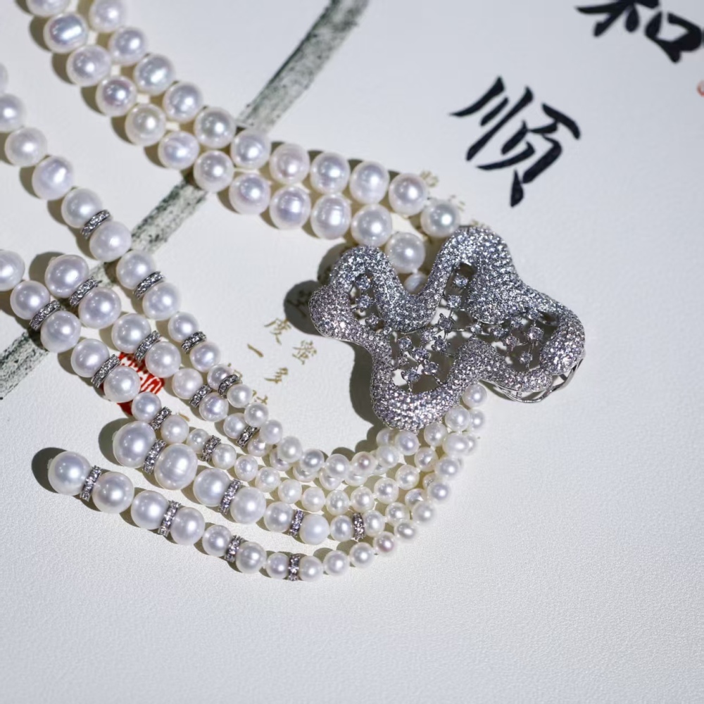Freshwater white cuclear-free luxury double-loop pearl sweater chain necklace paired with 925 silver accessories
