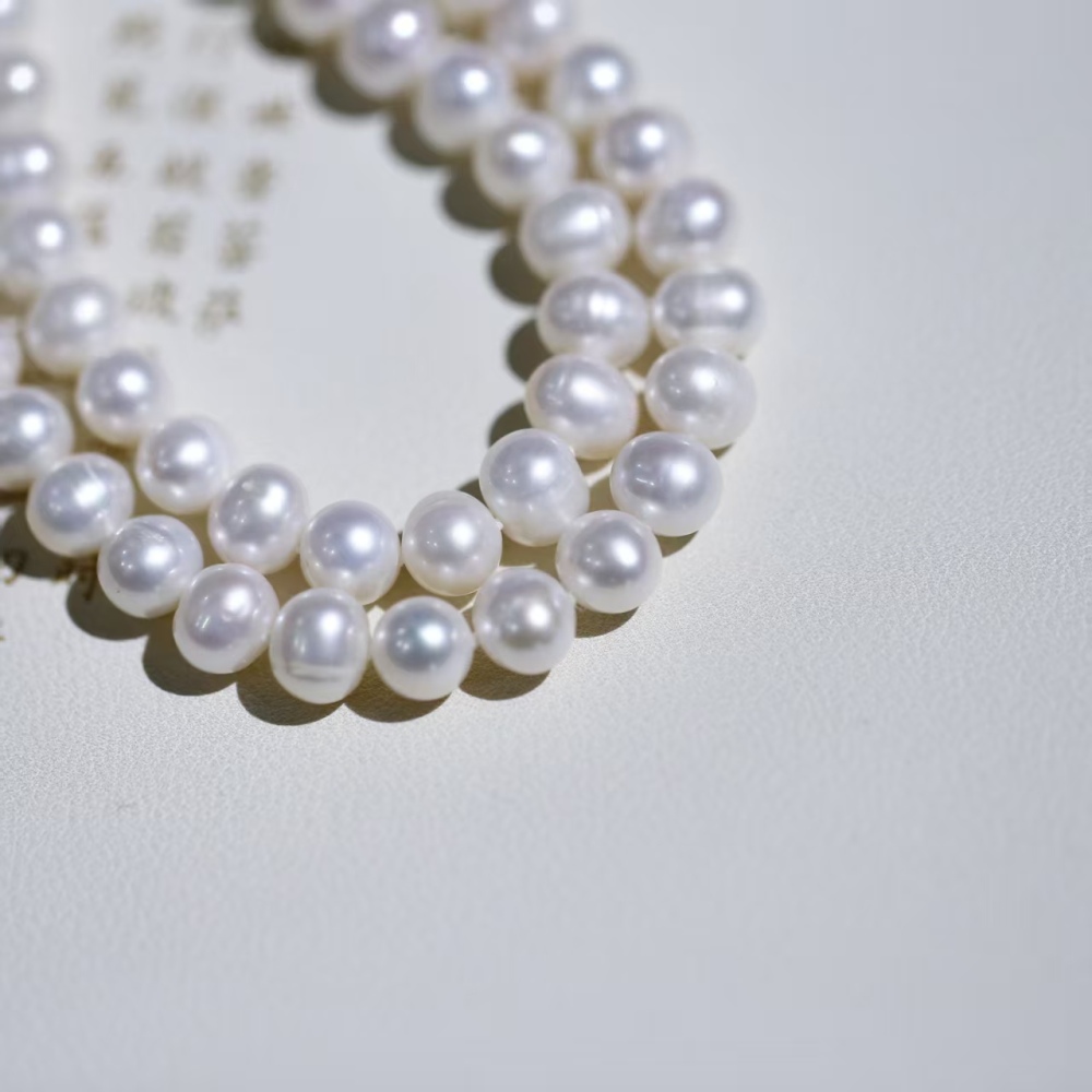 Freshwater white cuclear-free luxury double-loop pearl sweater chain necklace paired with 925 silver accessories