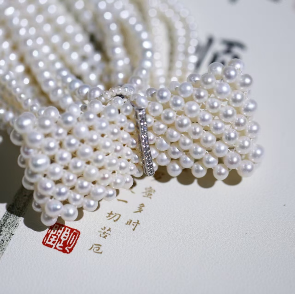 Freshwater white cuclear-free luxury hand-woven bowknot pearl choker necklace paired with 925 silver accessories