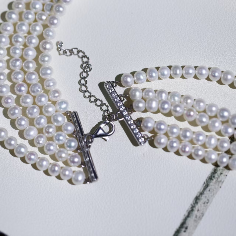 Freshwater white cuclear-free luxury hand-woven bowknot pearl choker necklace paired with 925 silver accessories