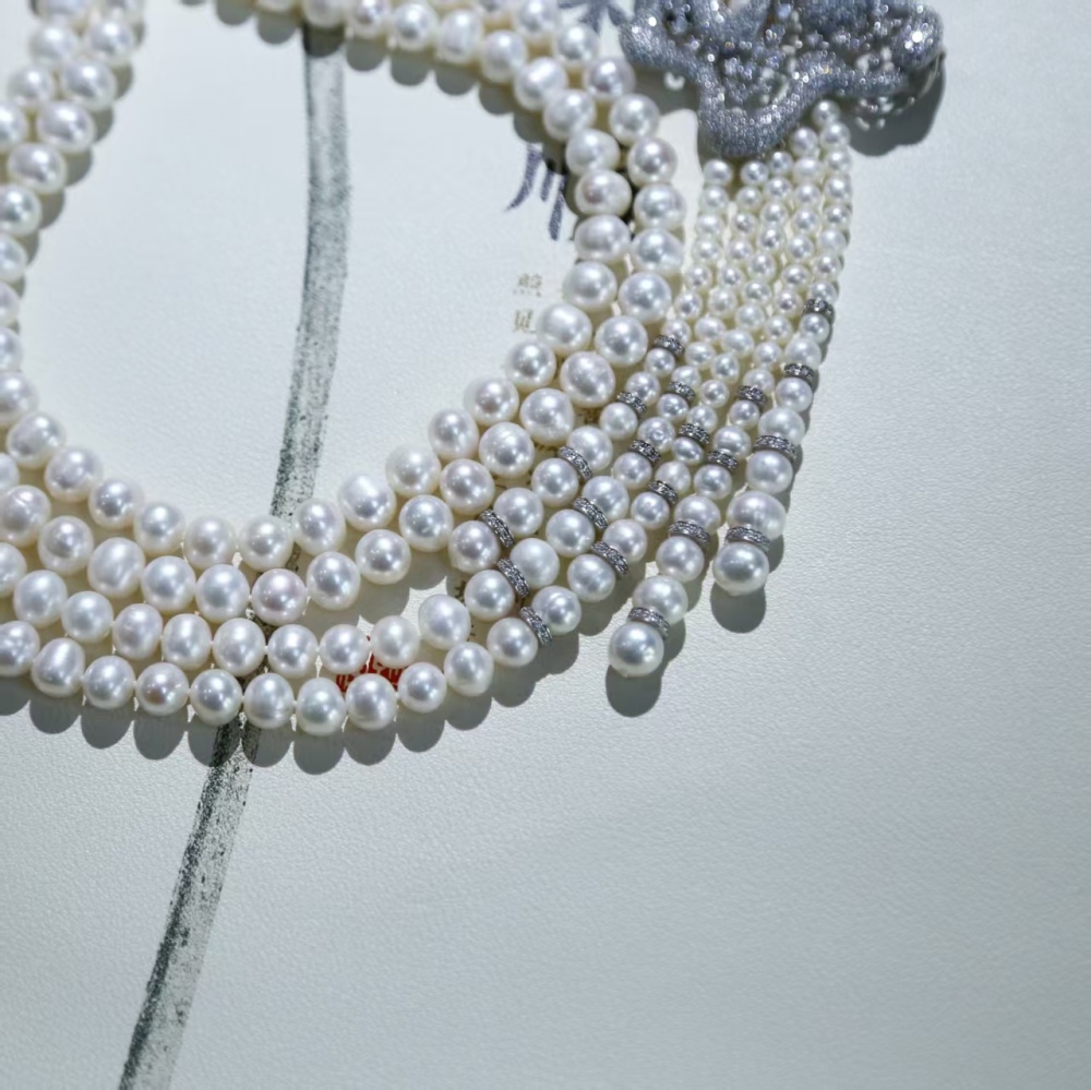 Freshwater white cuclear-free luxury double-loop pearl sweater chain necklace paired with 925 silver accessories
