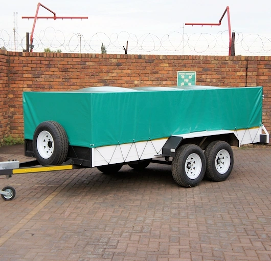 Custom Trailer Covers – Reliable Protection for Your Cargo.  Tailored to Meet Your Expectations.