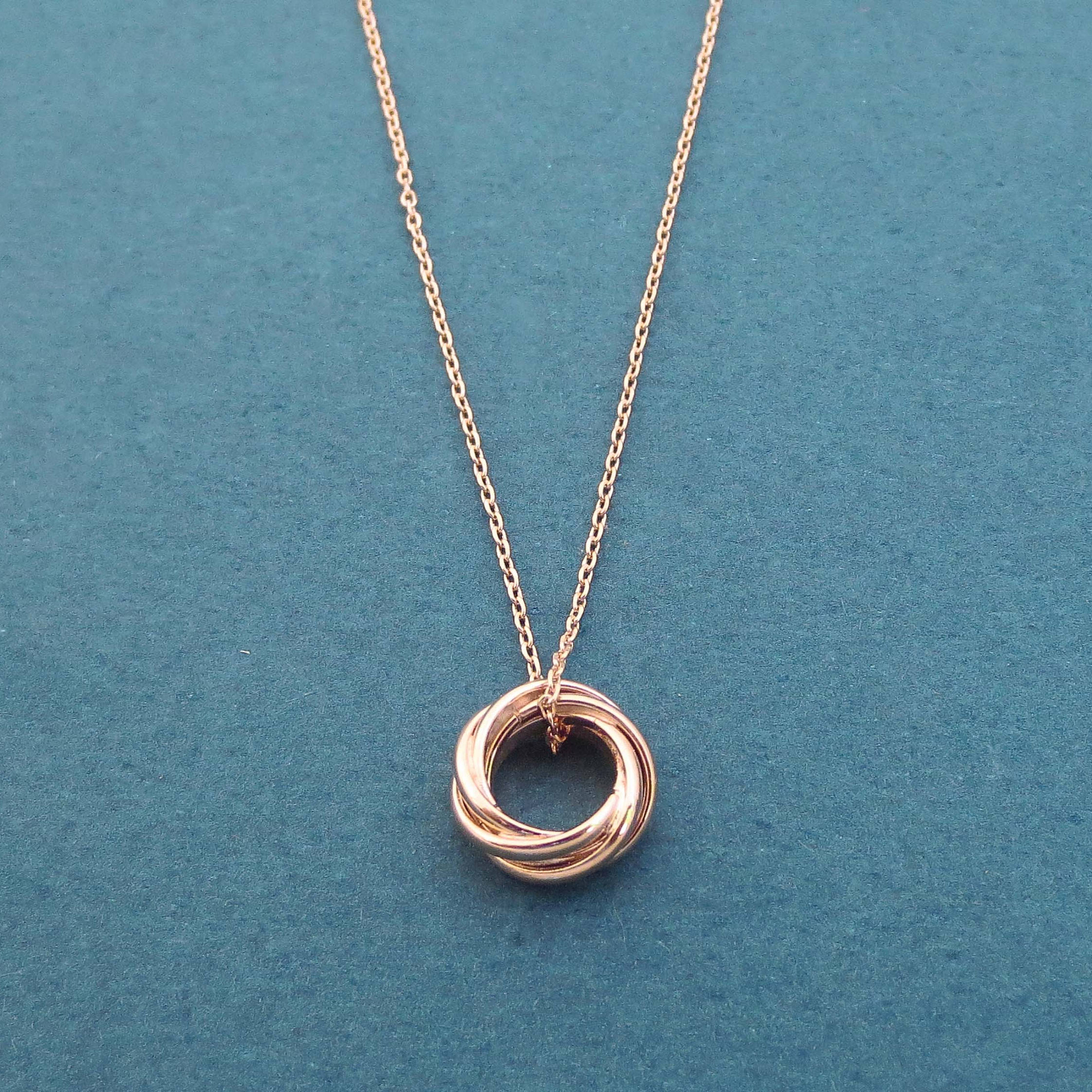 Sterling Silver Pink Gold Karma Triple Ring Necklace
