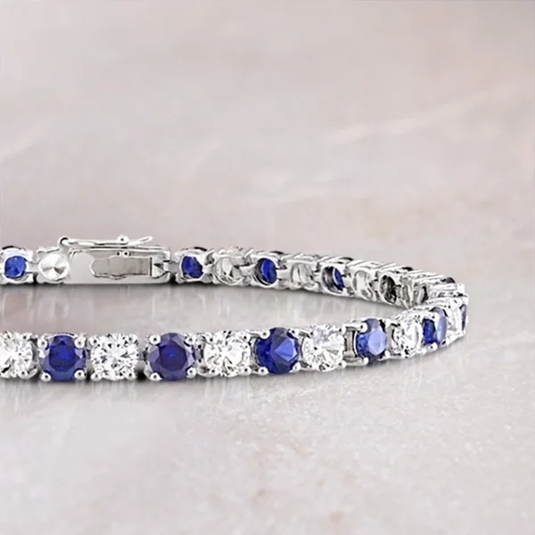 Landou Jewelry 925 Sterling Silver Created Blue and White Sapphire Patterned Birthstone Tennis Bracelet -7.25 in x 4.3mm x 2.7mm