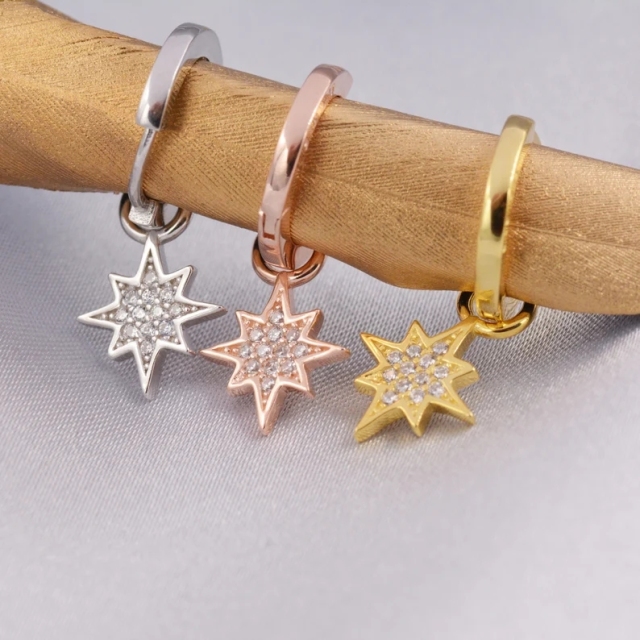 Starburst Charm Huggie Hoop Earrings in Sterling Silver with Detachable Star Burst Charms, North Star Celestial Geometric Design