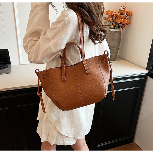 Timeless Textured Leather Tote with Versatile Carrying Options