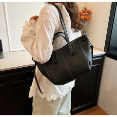 Timeless Textured Leather Tote with Versatile Carrying Options