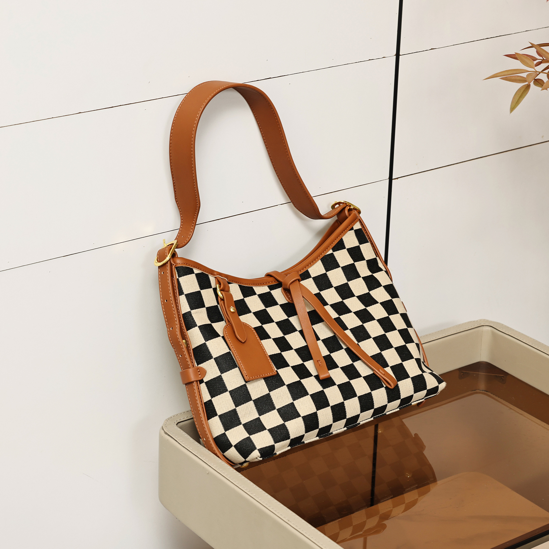 Versatile Checkered Hobo Bag with Stylish Trims