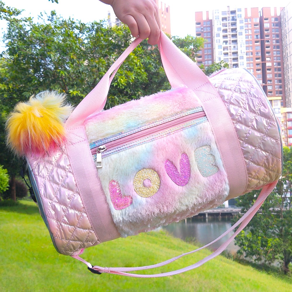 Iridescent knitted fabric, cylindrical travel and fitness bag.