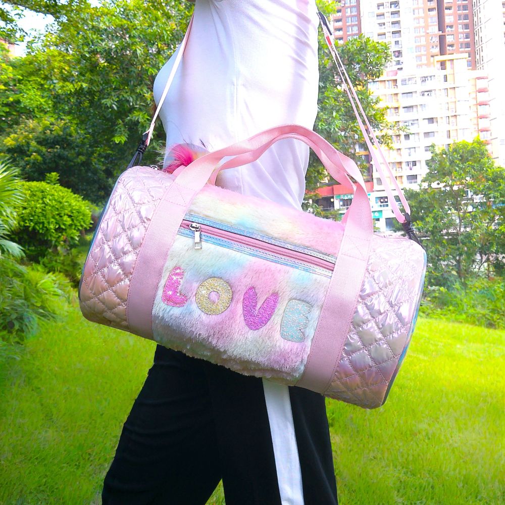 Iridescent knitted fabric, cylindrical travel and fitness bag.