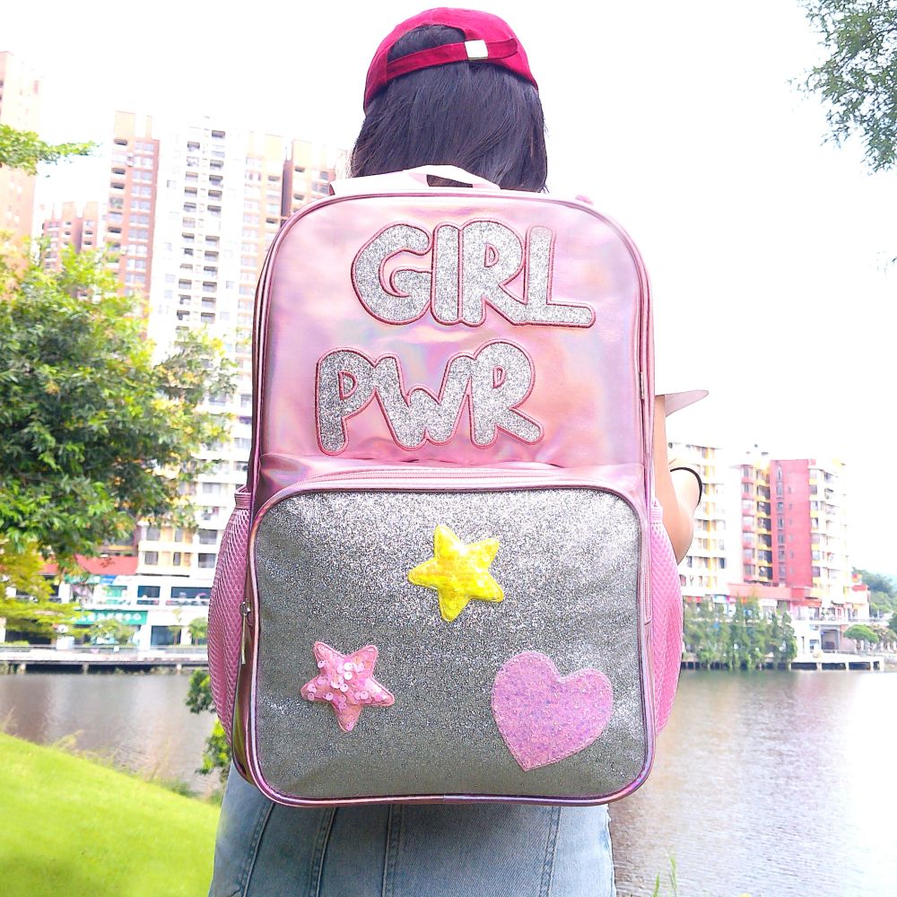 Laser-patterned iride-colored adhesive material, fashionable and waterproof backpack