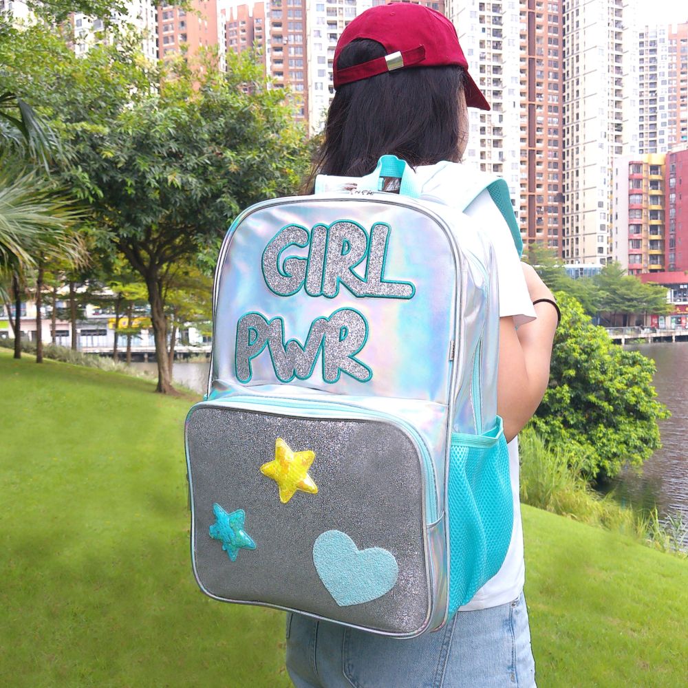 Laser-patterned iride-colored adhesive material, fashionable and waterproof backpack