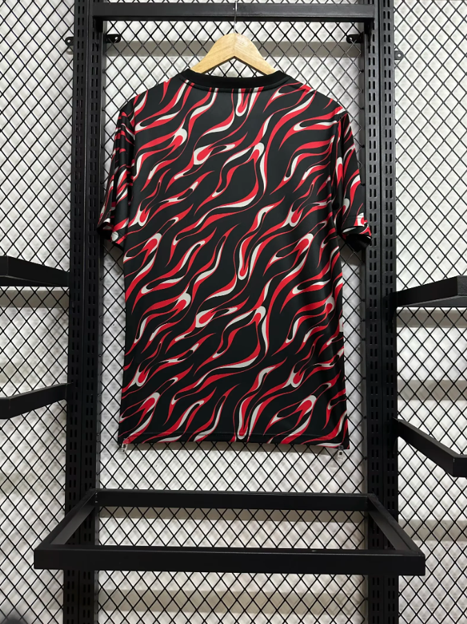 25-26 Manchester United's red and black training uniform