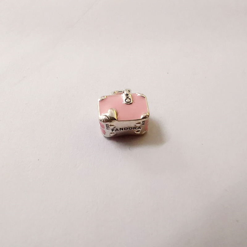 pandora sterling silver pink travel bag charm