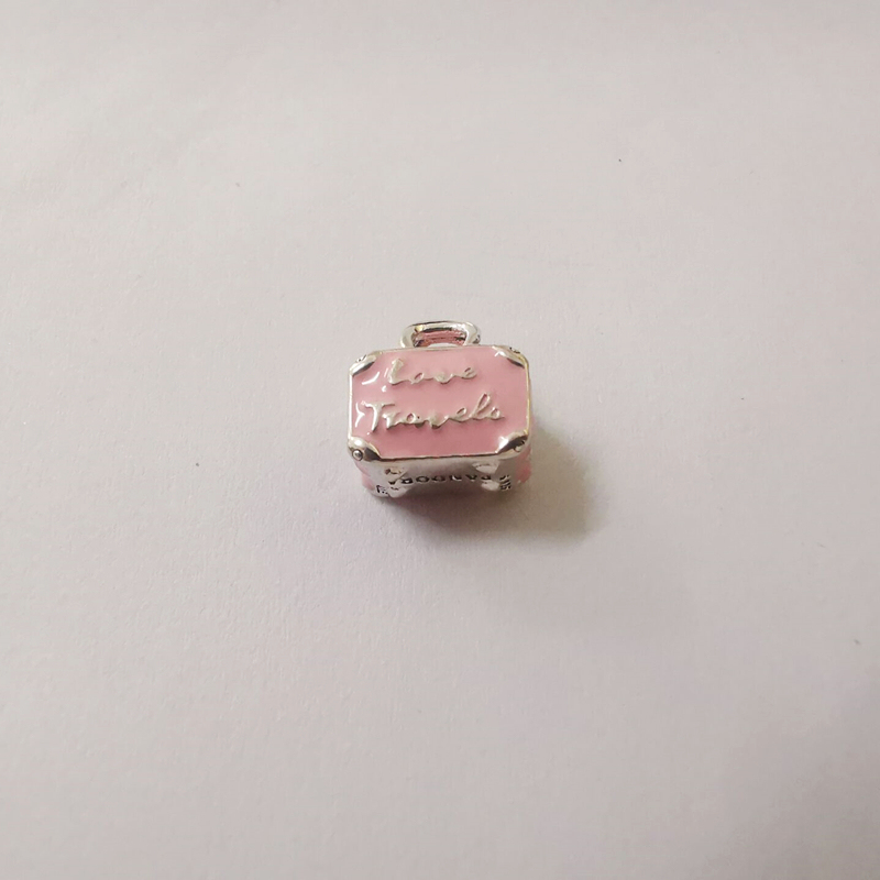 pandora sterling silver pink travel bag charm