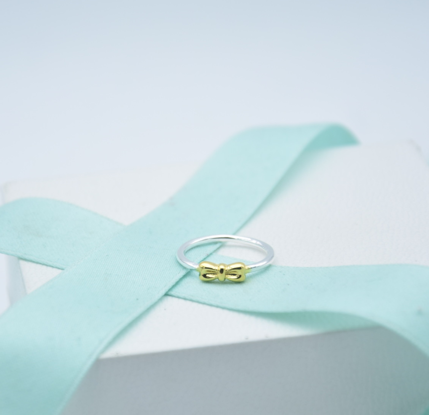 pandora gold bow with silver band ring