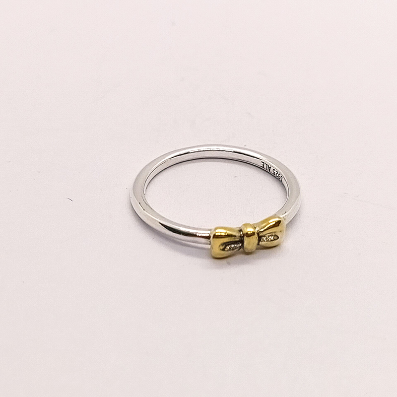pandora gold bow with silver band ring