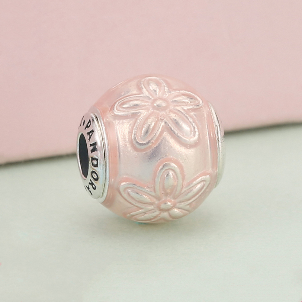pandora essence happiness charm, a symbolic daisy on pink enamel