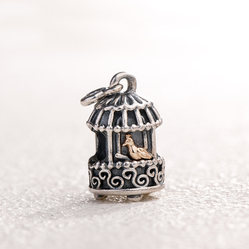 retired songbird pandora silver gold charm