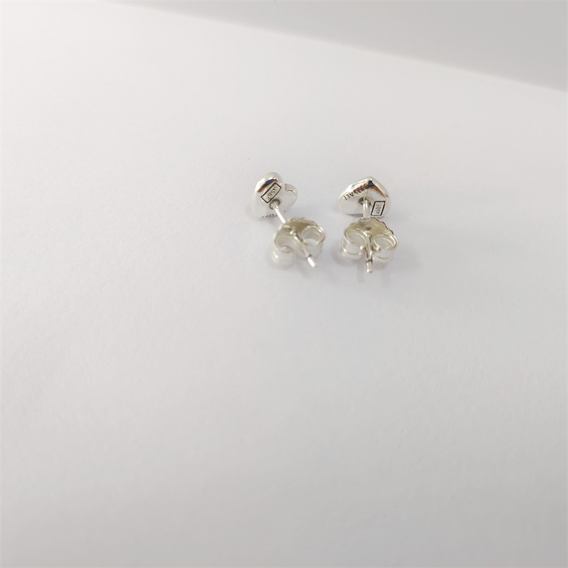 PANDORA Schmuck Damen-Ohrringe Ohrstecker Gewölbtes Goldherz