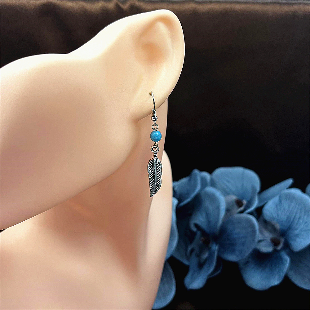 Sterling silver feather and turquoise earrings