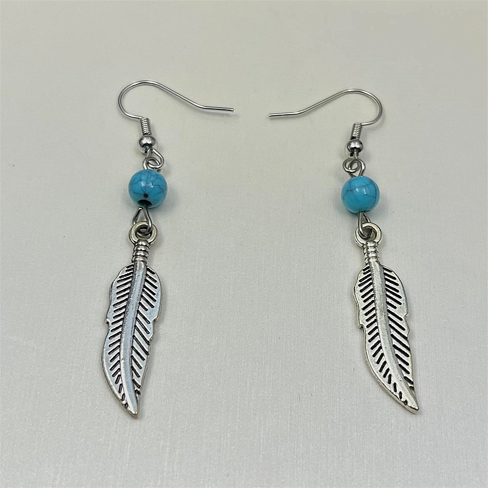 Sterling silver feather and turquoise earrings