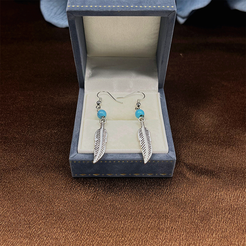 Sterling silver feather and turquoise earrings
