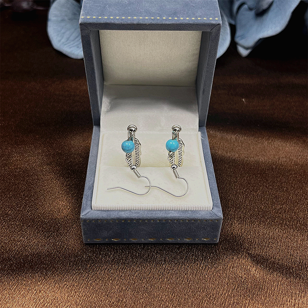 Sterling silver feather and turquoise earrings