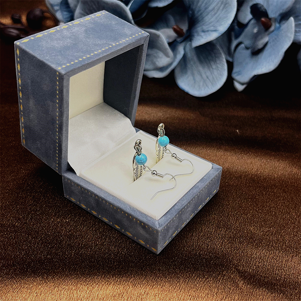 Sterling silver feather and turquoise earrings