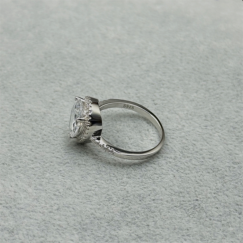 925 Sterling Silver Teardrop Shaped Diamond Ring with Pave Zircon Surround for Women