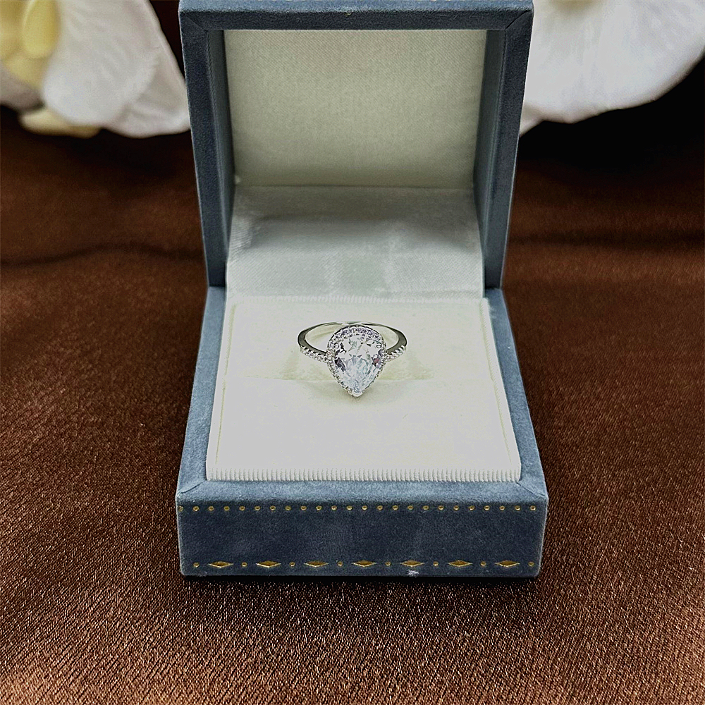 925 Sterling Silver Teardrop Shaped Diamond Ring with Pave Zircon Surround for Women
