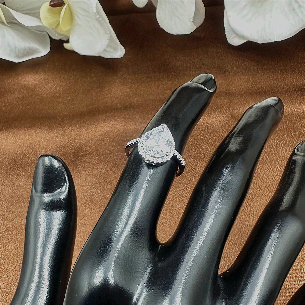 925 Sterling Silver Teardrop Shaped Diamond Ring with Pave Zircon Surround for Women