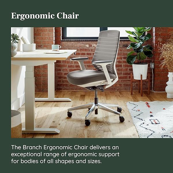 Silla ergonómica: una silla de escritorio versátil con soporte lumbar ajustable, respaldo de malla transpirable y ruedas suaves