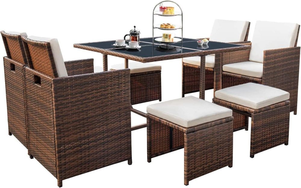 Devoko - Juego de 9 sillas de ratán para patio con mesa de vidrio y mesa de patio con asiento acolchado y parte trasera (beige)