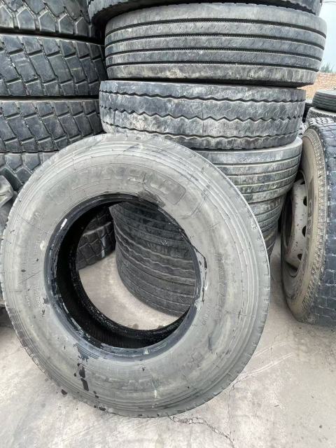 Second hand all-steel radial truck tires in the R17.5-R22.5 series.