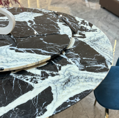 Bulgari Black Round Dining Table,eplaces technical specifications with sensory-rich descriptions ("captured moonlight," "liquid metal")
