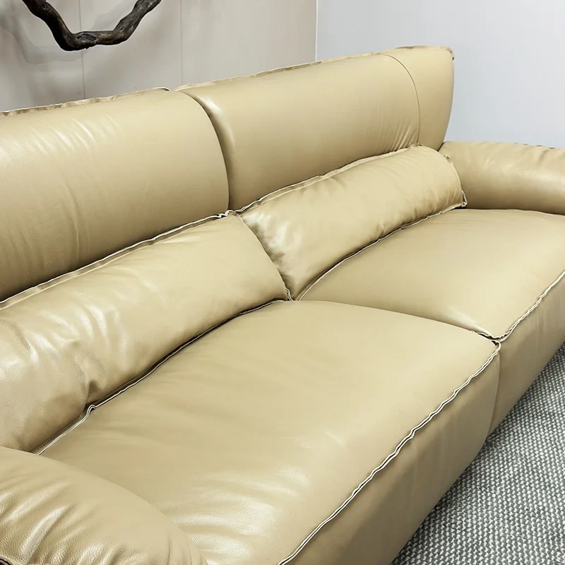 Elegant Cream Leather Sofa with Flared Armrests,Elegant Cream Leather Sofa with Flared Armrests