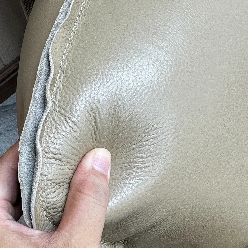 Elegant Cream Leather Sofa with Flared Armrests,Elegant Cream Leather Sofa with Flared Armrests